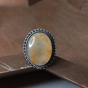 Yellow Agate ring with orange inclusions, size 9.5